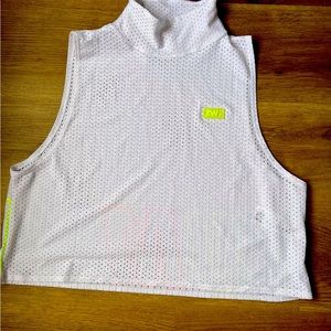 White Zumba Fitness slightly above the waist turtle neck tank.